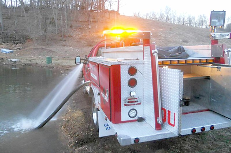 Firefighters have draft tested and hydro tested a rebuilt Squad 1 truck, which has a 300-gallon water tank and 100 feet of 1-inch booster line. The truck, when complete, will house rescue equipment and help firemen when they are on a call for a car fire, medical needs or extracation.