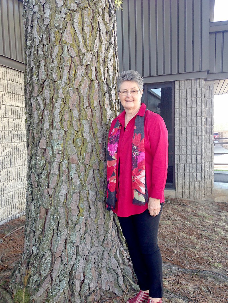 Photo by Sally Carroll Sam Alps was in school when her mom, Teddy, and her brother, Jim, planted this tree in 1955.