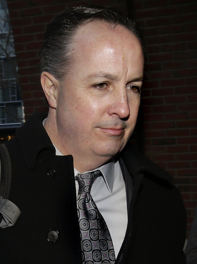 FILE - In this March 16, 2017, file photo, Barry Cadden arrives at the federal courthouse in Boston. A verdict has been reached Wednesday, March 22, 2017, in the case. Cadden, president of New England Compounding Center, faces multiple counts in a fungal meningitis outbreak from tainted steroids manufactured by the pharmacy, which killed dozens and sickened hundreds of people in 2012. (AP Photo/Steven Senne, File)