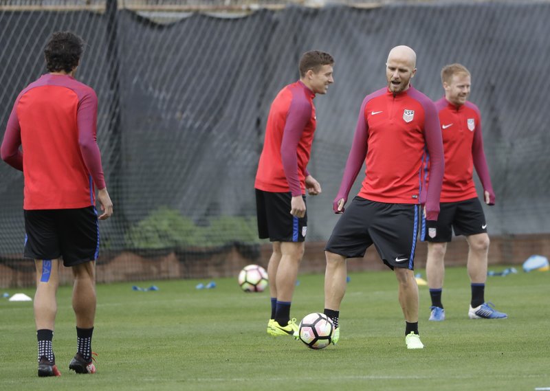 United States' Michael Bradley, right, warms up during a training session in preparation for a World Cup qualifying soccer match Wednesday, March 22, 2017, in San Jose, Calif.  (AP Photo/Marcio Jose Sanchez)