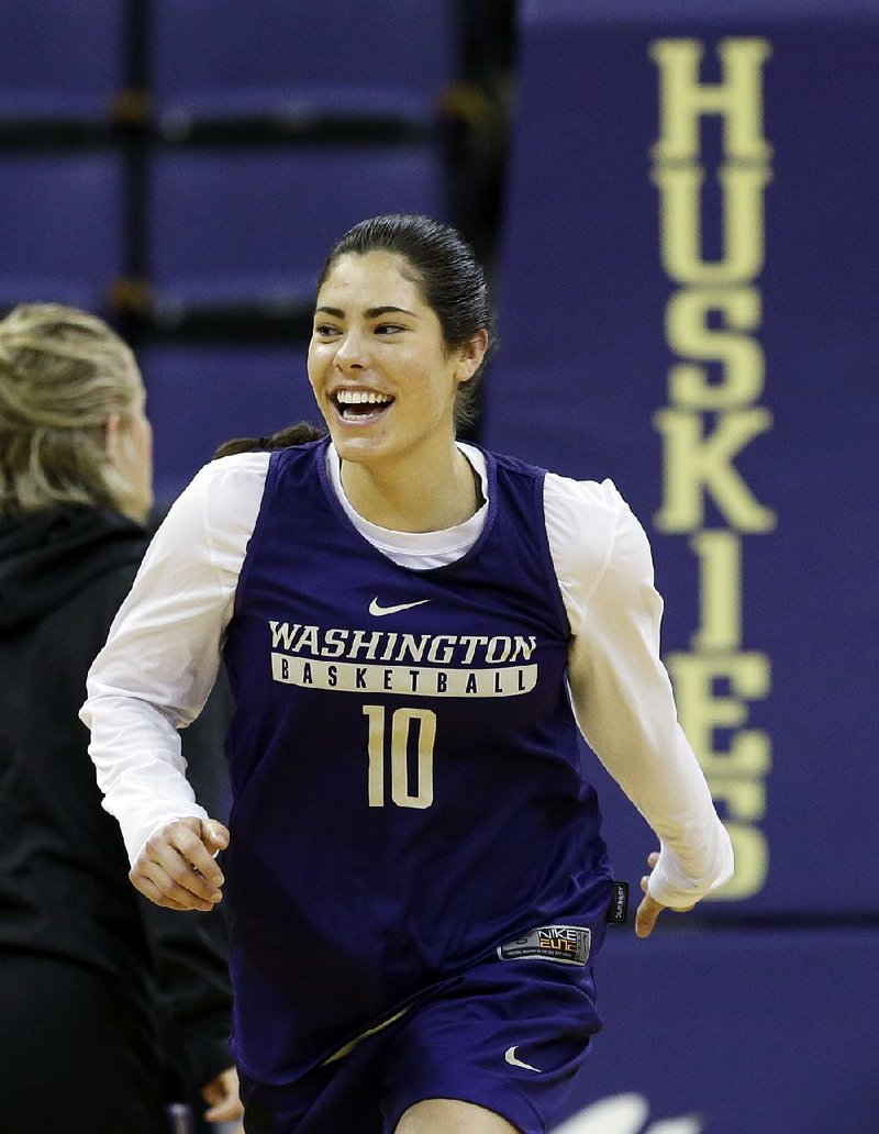 Washington's Kelsey Plum smiles as she runs up court at a practice a day before the team's first round NCAA tournament college basketball game Friday, March 17, 2017, in Seattle. 