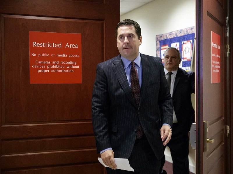 House Intelligence Committee Chairman Rep. Devin Nunes, R-Calif. arrives to give reporters an update about the ongoing Russia investigation, Wednesday, March 22, 2017, on Capitol Hill in Washington. 