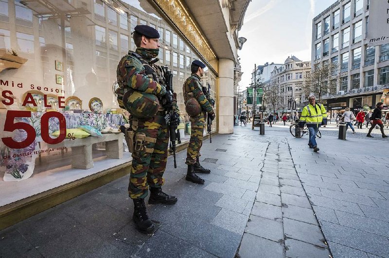 Soldiers patrol Thursday on Meir shopping street in Antwerp, Belgium.