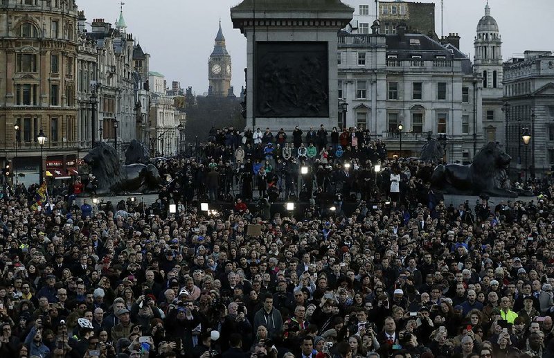 Crowds gather Thursday at Trafalgar Square in London at a vigil for the victims of Wednesday’s attack.