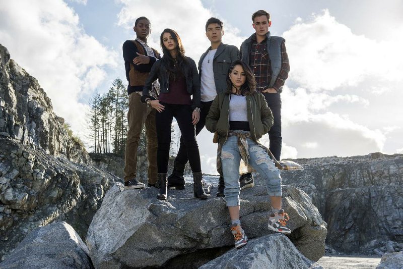 Power Rangers assemble: Billy (RJ Cyler), Kimberly (Naomi Scott), Zack (Ludi Lin), Trini (Becky G.) and Jason (Dacre Montgomery) are high school kids with normal teenage problems who also have to find a way to save their town from an alien threat in Power Rangers. 
