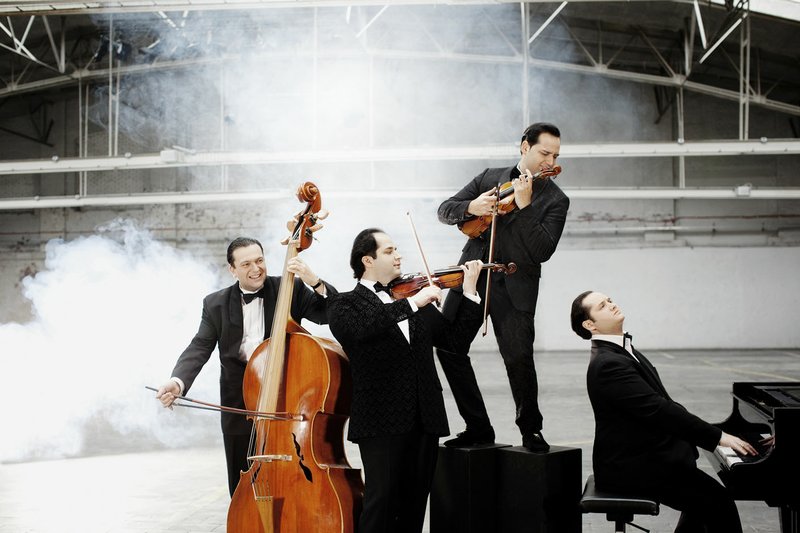 The Janoska Ensemble — three brothers and their brotherin-law from Vienna — puts a unique spin on classical music, infusing jazz, traditional music, pop, Balkan, Latin American rhythms and tango. The group performs Tuesday at the Walton Arts Center.
