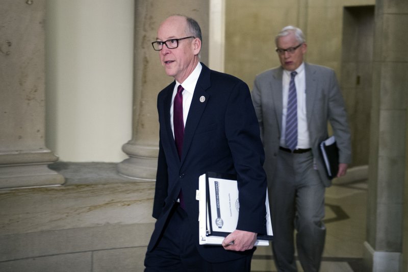 House Energy and Commerce Committee Chairman Rep. Greg Walden, R-Ore., one of the stewards of the Republican health care legislation, leaves the Capitol Hill office of House Speaker Paul Ryan of Wisconsin on Friday, March 24, 2017, as the House nears a vote on their health care overhaul.