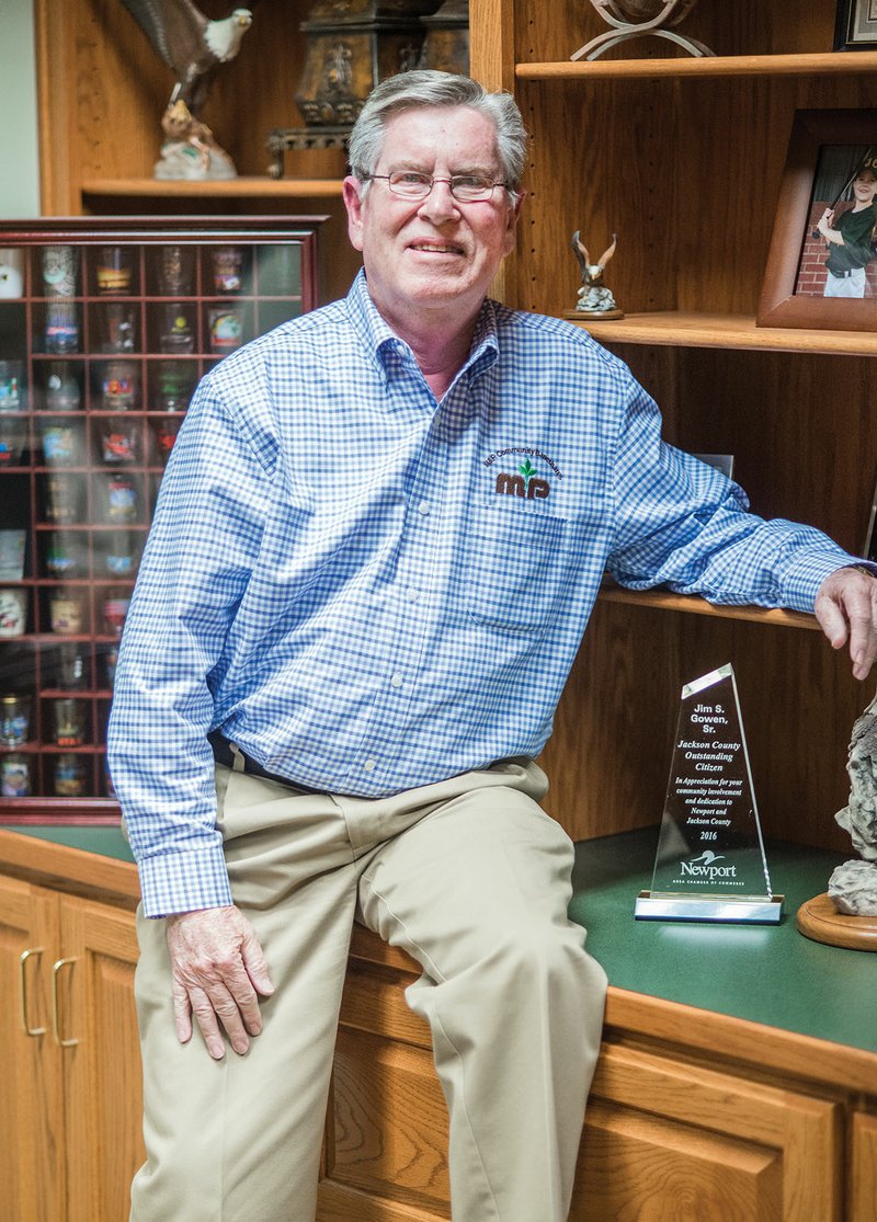 Jim S. Gowen Sr. of Newport is the recipient of the 2016 Jackson County Outstanding Citizen Award from the Newport Area Chamber of Commerce. He is chairman of the board of directors at Merchants and Planters Bank. He is shown here in his office with that award, bottom right, and with his display of shot glasses that he has personally collected from all 50 states, left.