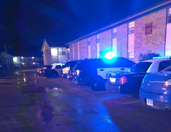 Police investigate a double shooting at a Little Rock apartment complex Friday night. 