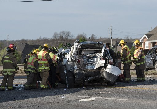 Springdale, Lowell and Bethel Heights Fire department's work to free a driver from a vehicle crash on North Thompson south of Wagon Wheel.