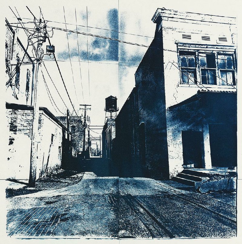 Wholesale Warehouse, Helena, AR, is a cyanotype print by Beverly Buys. It is part of her exhibition “Delta in Blue” at the Argenta branch of the Laman Public Library System in North Little Rock.