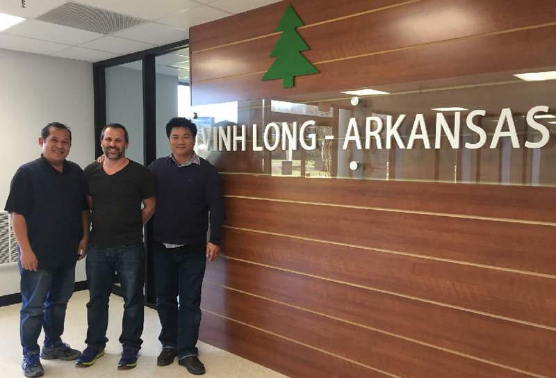 Dung Tran (left) Danial Evans and Le Thai Tinh are three of the 11 employees of Vinh Long, a Vietnamese manufacturing company that will open in Morrilton.
