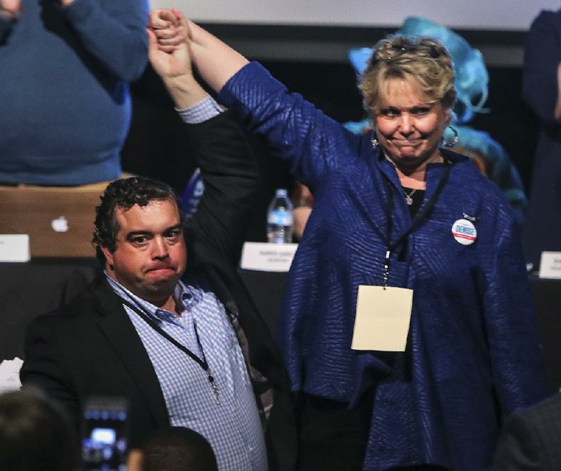 State Rep. Michael John Gray of Augusta and Denise Garner, a nonprofit executive from Fayetteville, vied Saturday to become chairman of the state Democratic Party.