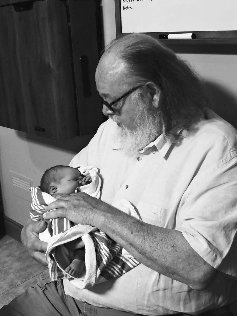 Courtesy photo &#8220;Gramps&#8221; meets new baby Cecelia Jean, adding another generation to columnist&#8217;s ever expanding family of choice.