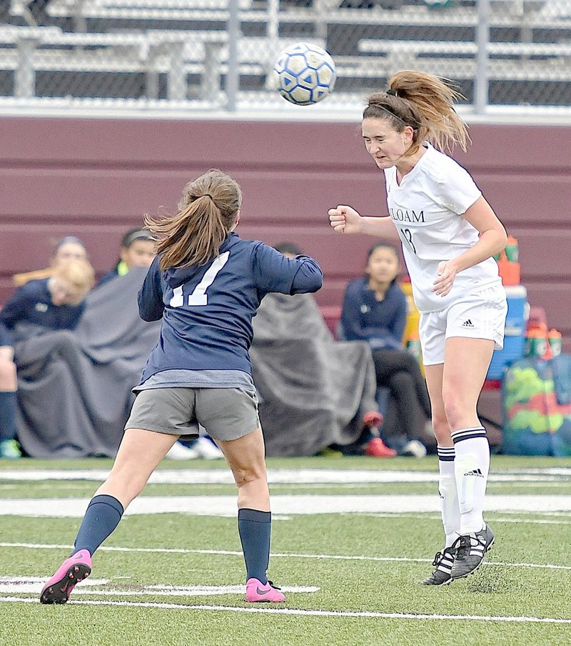 Bud Sullins/Special to Siloam Sunday Siloam Springs junior midfielder Brooklyn Buckminster heads the ball against Greenwood on March 16. The Lady Panthers are scheduled to host Muskogee, Okla., on Monday at Panther Stadium.