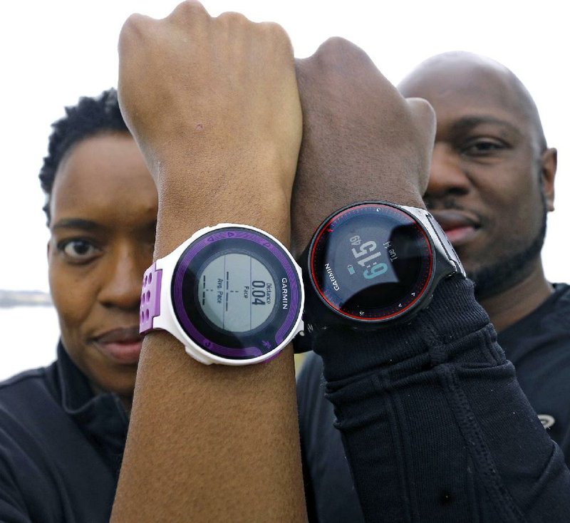 Pamela Royal works out with a Garmin Forerunner 220, and her husband, Kijana Royal, wears a Garmin Forerunner 225 GPS. Among their other features, these two fitness-tracking watches also tell time.