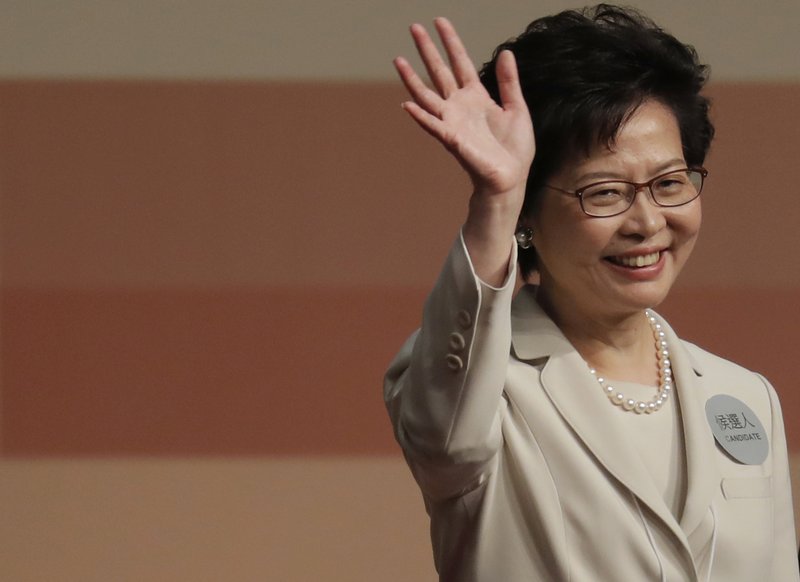 Former Hong Kong Chief Secretary Carrie Lam declares her victory in the chief executive election of Hong Kong in Hong Kong, Sunday, March 26, 2017. A Hong Kong committee has chosen the government's former No. 2 official Lam to be the semiautonomous Chinese city's next leader. 