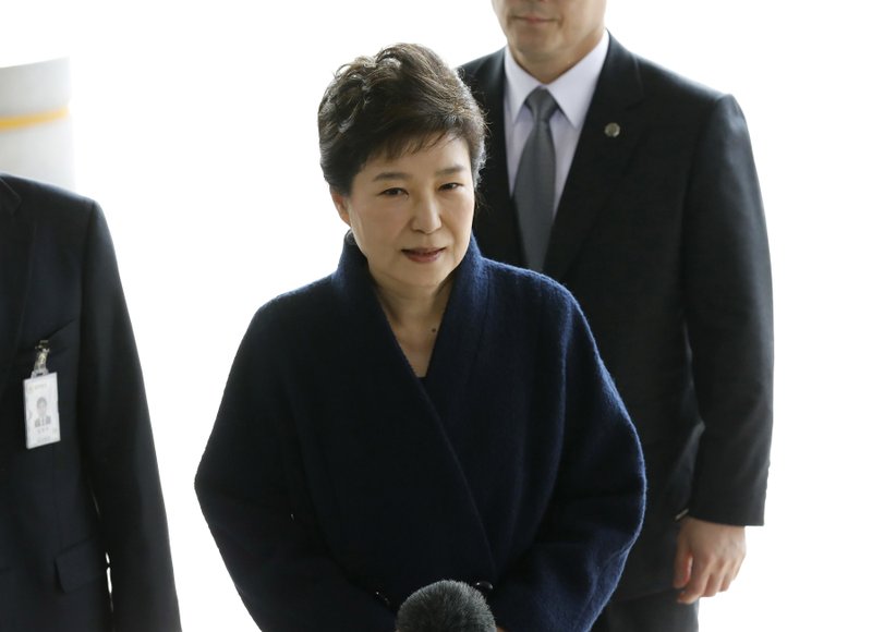 In this March, 21, 2017 file photo, South Korea's ousted leader Park Geun-hye arrives at a prosecutor's office in Seoul, South Korea. 