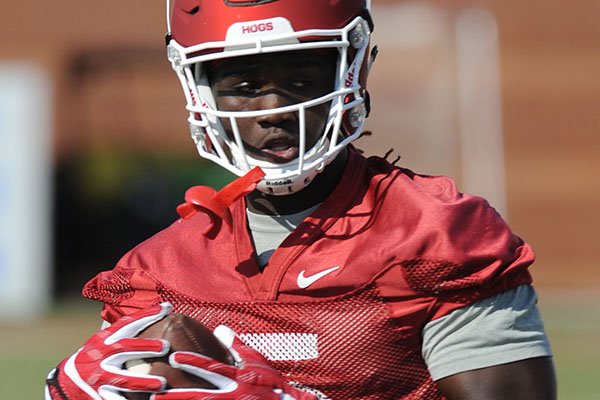 Arkansas receiver Brandon Martin makes a catch Tuesday, March 28, 2017, during spring practice at the UA practice facility in Fayetteville.