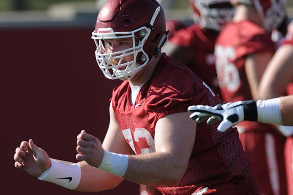 Arkansas offensive lineman Frank Ragnow moves through a drill Tuesday, March 28, 2017, during spring practice at the UA practice facility in Fayetteville.