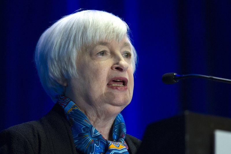 Federal Reserve Chair Janet Yellen speaks at the Federal Reserve System Community Development Research Conference in Washington, Thursday, March 23, 2017. Yellen said a new Federal Reserve survey has found that children who grew up in poverty were twice as likely to struggle with financial challenges later in life. (AP Photo/Cliff Owen)