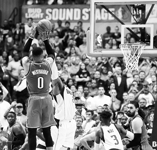 The Associated Press DAGGER SHOT: Russell Westbrook squares up for the jumper that gives Oklahoma City a 92-91 road win over Dallas Monday night. Westbrook scored 37 points, 16 in the fourth quarter, and added 13 rebounds and 10 assists for his third straight triple-double and 37th of the season.