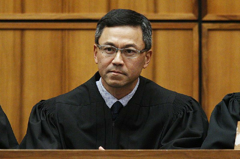  This Dec. 2015 file photo shows U.S. District Judge Derrick Watson in Honolulu. 