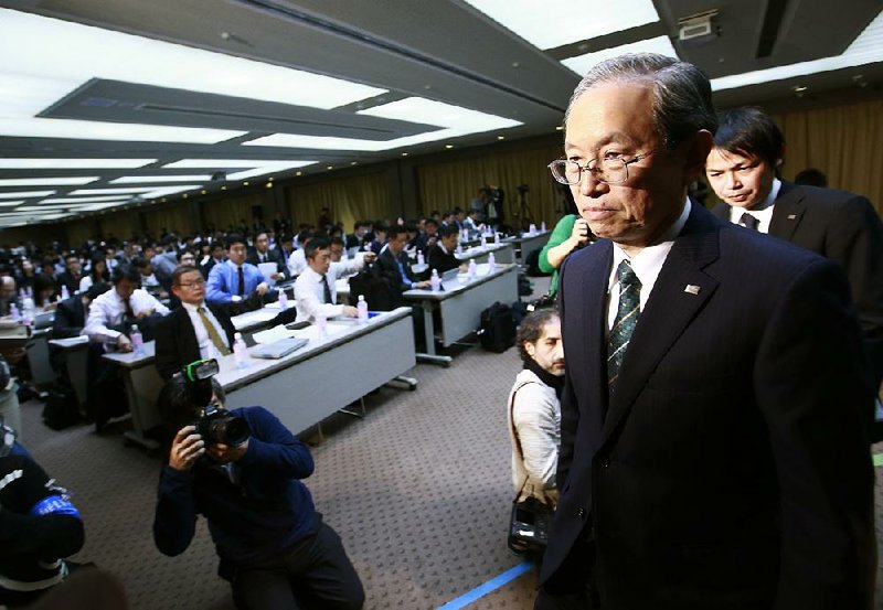 Toshiba Corp. President Satoshi Tsunakawa leaves after a news conference Wednesday at the company’s headquarters in Tokyo. 