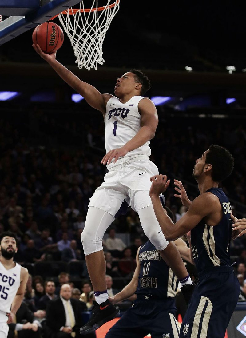 TCU guard Desmond Bane drives to the basket during Thursday’s game at Madison Square Garden in New York.
The Horned Frogs cruised to an 88-56 victory to win the NIT title.