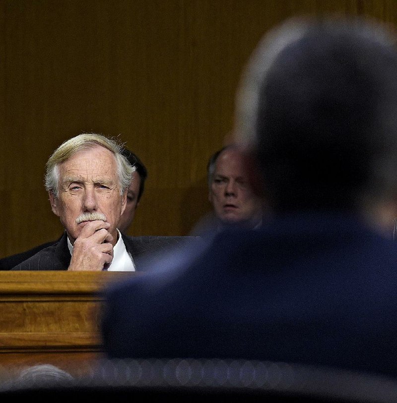 Sen. Angus King, I-Maine, listens to testimony Thursday in the Senate Intelligence Committee from Clint Watts, a national security analyst and former FBI agent, who noted that several Russians tied to the Kremlin inquiry have been killed in recent months and said he fears for his safety.