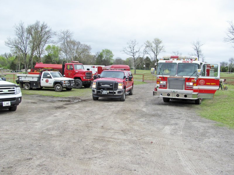 Sebastian County officials prepare Thursday morning to retrieve county fire equipment taken from the dissolved Jenny Lind Volunteer Fire Department and found parked at the Cedarville Fire Department in Crawford County. Officials say unidentified persons donated the firefighting equipment without authority to Cedarville.
