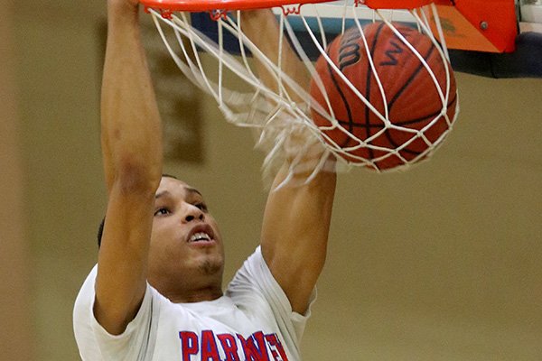 Khalil Garland of Little Rock Parkview dunks during the All-Metro Classic on Tuesday, March 14, 2017, in Little Rock. 