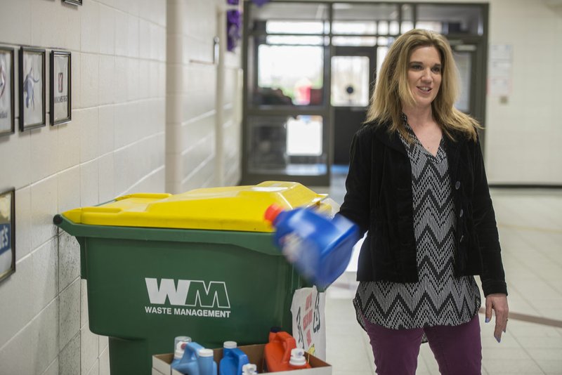 Lynn Ryan, principal at Walker Elementary School, talks Thursday about a recycling campaign that will earn the school a new outdoor bench in Springdale. Walker doesn’t receive any Title 1 money, but still provides its students with all the educational advantages of a school that does receive Title 1 money, she said.