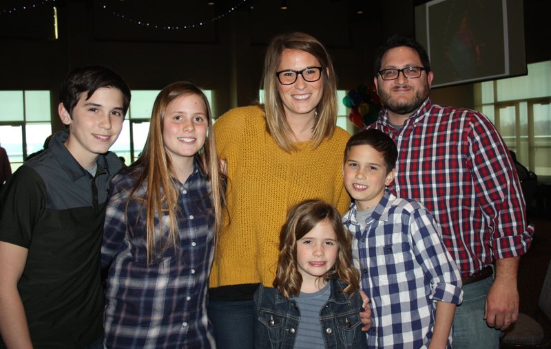 NWA Democrat-Gazette/CARIN SCHOPPMEYER The Brown family, William (from left), Kate, Alicia, Liv, Eli and Nate are named the Life Styles Volunteer Group of the Year at the annual Celebration of Possibilities luncheon March 8 at the Fayetteville Town Center.