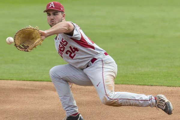 Arkansas' Chad Spanberger makes the stop on a ball hit by Alabama's Tanner DeVinny during an NCAA college baseball game Sunday, April 2, 2017, in Tuscaloosa, Ala. (Vasha Hunt/AL.com via AP)