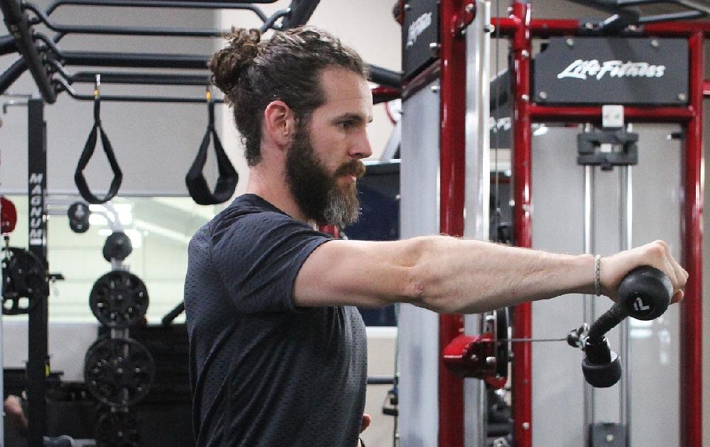 Lateral Rope Extension targets triceps muscles