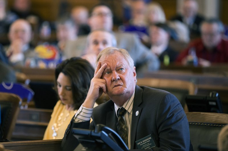 Representative Jan Kessinger, R-Overland Park, casts a quizzical expression as he watches the voting board on the House floor as House members cast their votes, Monday, April 3, 2017, at the Statehouse in Topeka, Kans. A measure to override Gov. Sam Brownback's veto of a Medicaid expansion bill failed by three votes. Kessinger voted in favor of overriding the veto. 