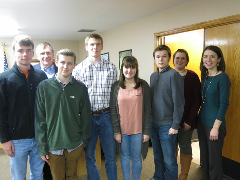 Photo by Susan Holland Members of the Gravette High School Quiz Bowl team attended the March meeting of the Gravette school board and led the Pledge of Allegiance to open the meeting. Following the Pledge, they posed with board president Jay Oliphant (second from left). Pictured are team members Dalton Vanderpool, Harrison Brown, Drew Hendren, Micah Wallace, Billy Cook and their teacher sponsors Alison Schaffer and Megan Bassing.
