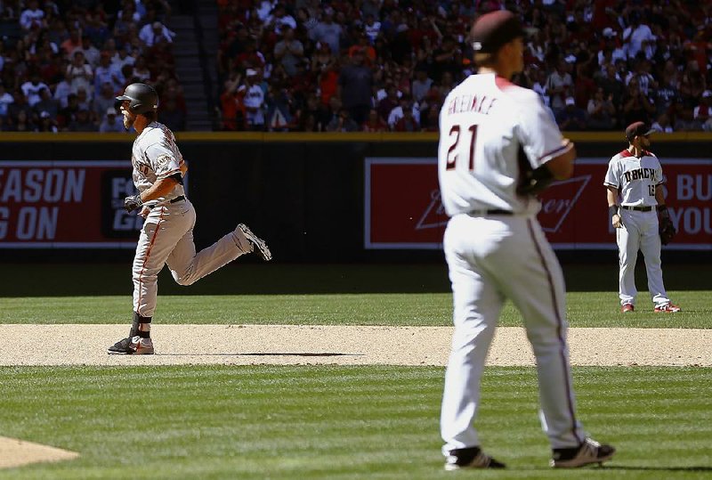 Madison Bumgarner is 1st pitcher to hit 2 home runs on opening day 