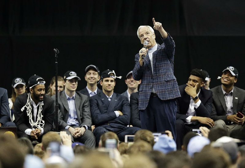 North Carolina Coach Roy Williams addresses supporters during a ceremony to honor the Tar Heels, who won their sixth national championship Monday by beating Gonzaga 71-65. Williams will have some talent returning next season, but he’ll also lose several key contributors to either graduation or NBA Draft declarations.