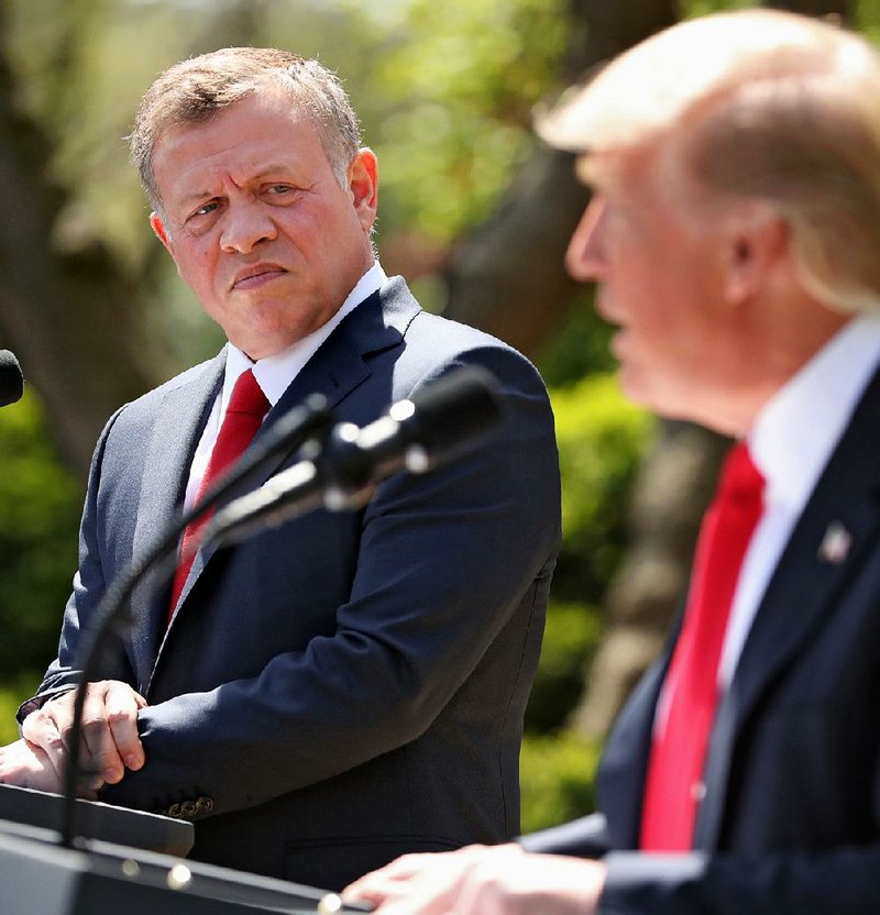 King Abdullah II of Jordan and President Donald Trump speak at a news conference Wednesday at the White House. Trump refused to say what the U.S. response would be to the chemical attack in Syria.