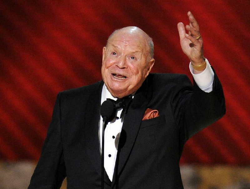 In this Sept. 21, 2008 file photo, Don Rickles is honored for best individual performance in a variety or music program for "Mr. Warmth: The Don Rickles Project," at the 60th Primetime Emmy Awards in Los Angeles. 