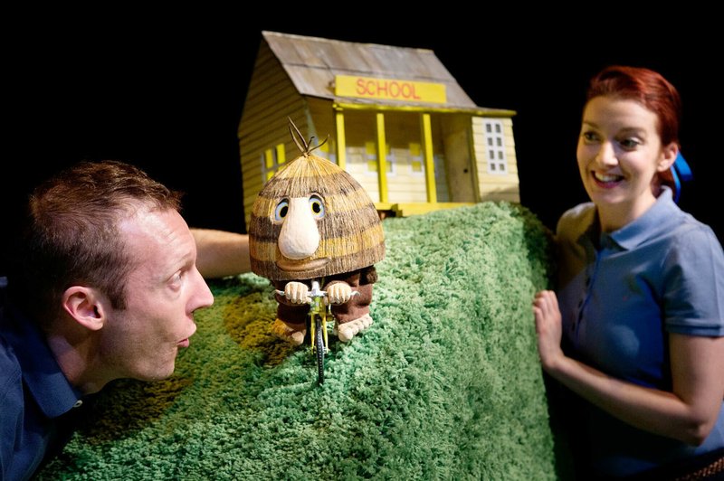Windmill Theatre Company’s Nathan O’Keefe, left, and Ellen Steele help Grug find his rainbow.