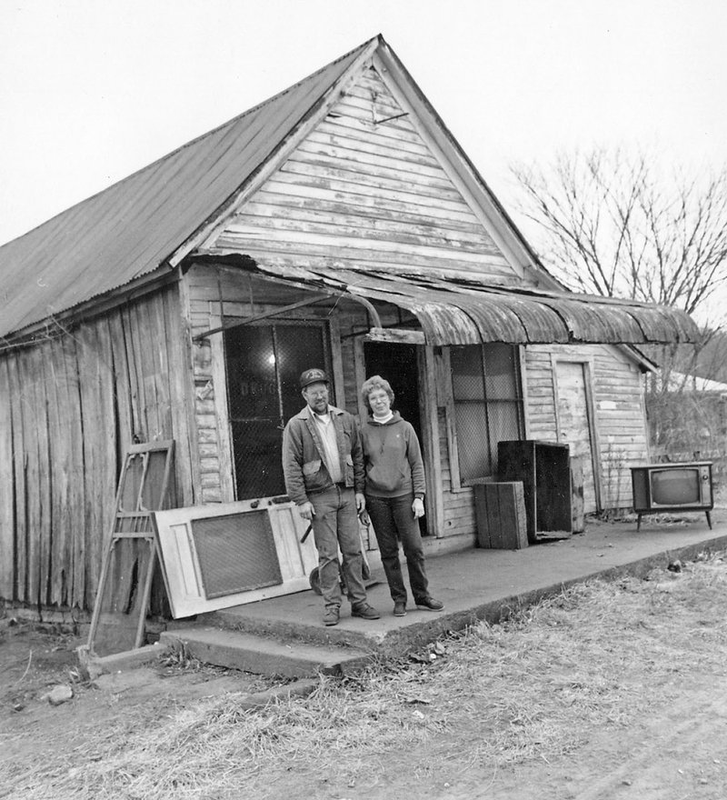 Wayne and June Martin, pictured in front of the old Mooney-Barker Drug Store in Pettigrew, were instrumental in the preservation of the community’s school house.