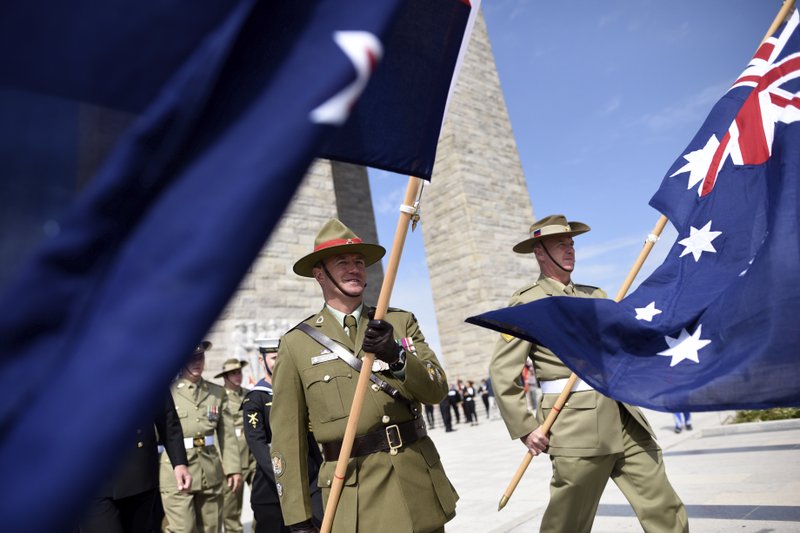 In this April 24, 2016, file photo, soldiers from Australia and New Zealand march during the Turkish International Service at Mehmetcik Abide on the Gallipoli Peninsula, Turkey. 