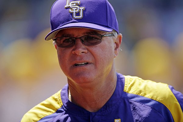 LSU head coach Paul Mainieri walks off the field after defeating UNC Wilmington at the Baton Rouge Regional of the NCAA college baseball tournament in Baton Rouge, La., Monday, June 1, 2015. (AP Photo/Gerald Herbert)

