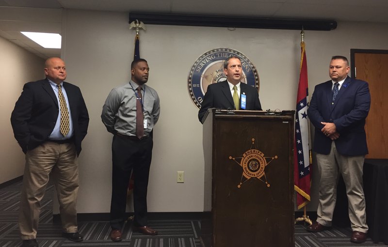 Pulaski County sheriff's office officials hold a news conference on the case of Jason L. Jackson, a deputy sheriff who was found dead from a gunshot wound in a car in April 2011.