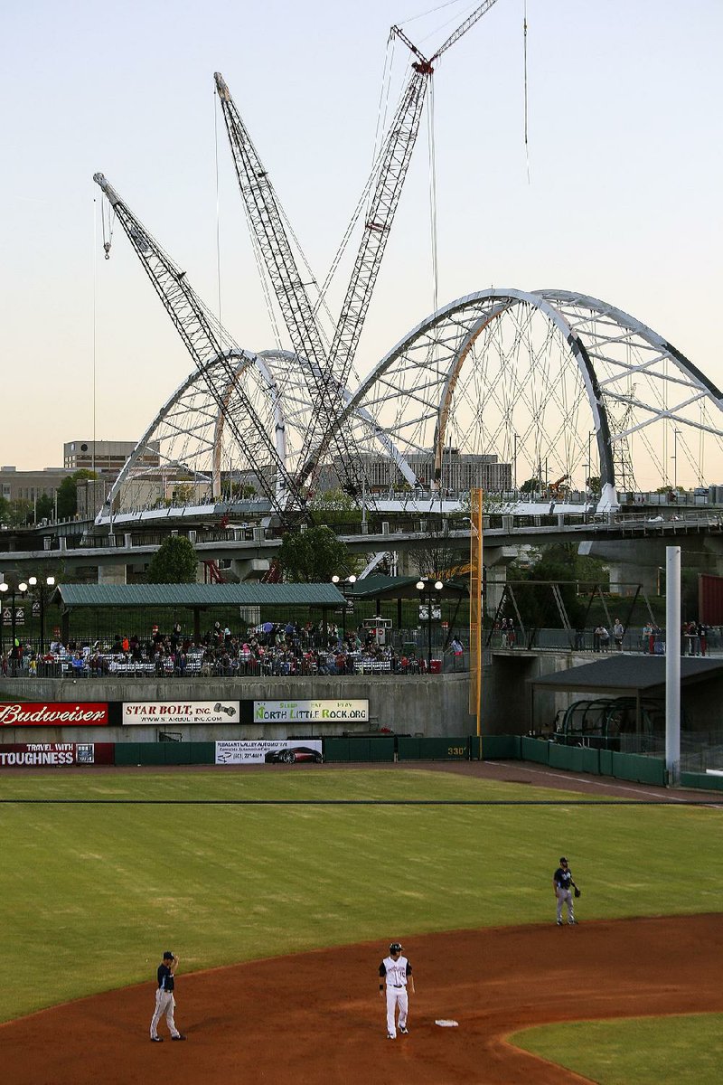 The newly remodeled Broadway Bridge adds to the backdrop at Dickey-Stephens Park in North Little Rock, where an announced crowd of 8,445 saw the Arkansas Travelers beat the Corpus Christi Hooks 6-1 on Friday night.