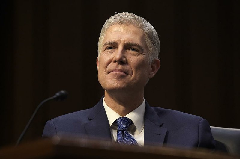 Supreme Court Justice nominee Neil Gorsuch listens to opening statements on Capitol Hill in Washington, Monday, March 20, 2017, during his confirmation hearing before the Senate Judiciary Committee.