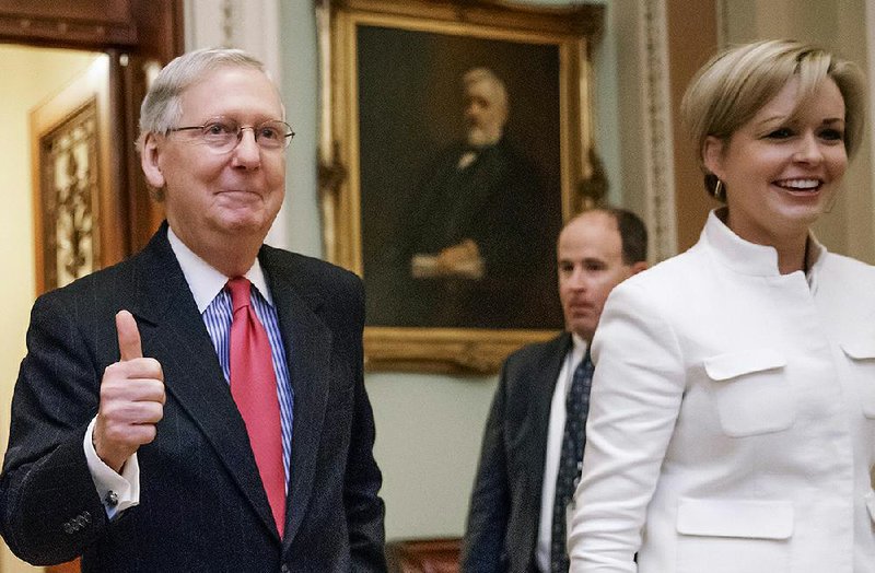 Senate Majority Leader Mitch McConnell leaves the Senate chamber after Thursday’s vote on changing the filibuster rule. He accused Democrats of trying to politicize the courts and confirmations.